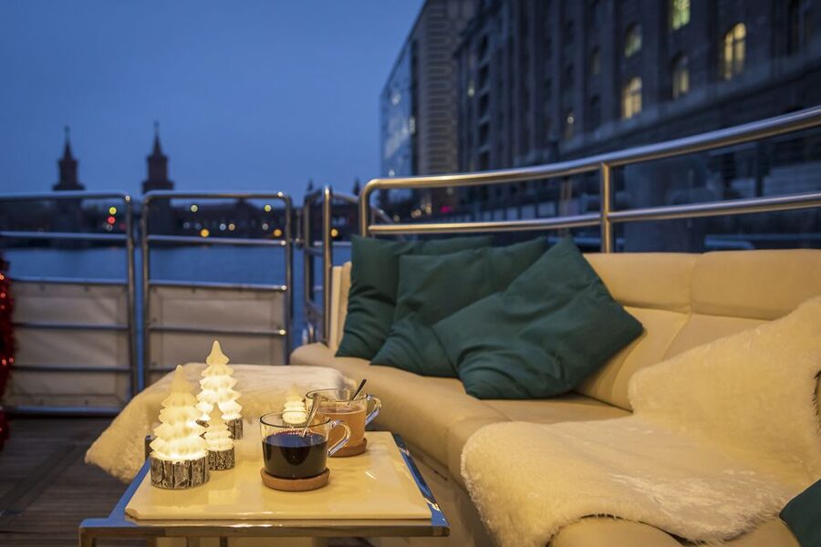Berlin: Christmas Sightseeing Boat Tour - Onboard comfort: warm indoors, smooth water, and practical toilets