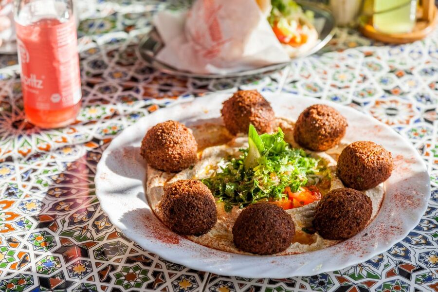 Berlin: Downtown Food Tour with 8 Authentic Local Tastings - Berliner doughnut stop, jam first, questions welcome