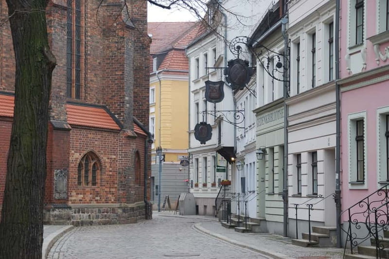 Berlin: Historic Center Walking Tour with a Real Berliner - Entering Mitte: starting outside Nikolaikirche and setting the timeline