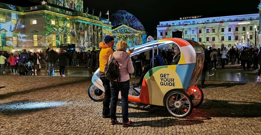 Berlin: Illuminated Berlin by Bike Taxi - Electric bike taxi comfort: blankets, cold air, and short walking breaks