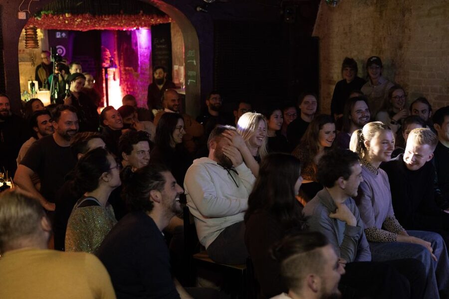Berlin: The Dark Humor Comedy Show in English Entry Ticket - Entering the venue: phone ticket, door greeting, and your first shot