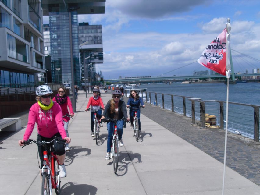 Cologne: 3-Hour Guided Bike Tour - Riding the Rhine to Rheinauhafen and the Crane Houses