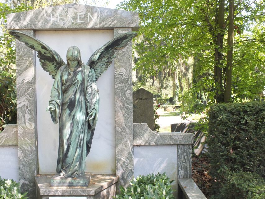 Cologne: Melaten Cemetery Life, Love and Death Tour - Ornate tombs you can actually read, with help from your guide