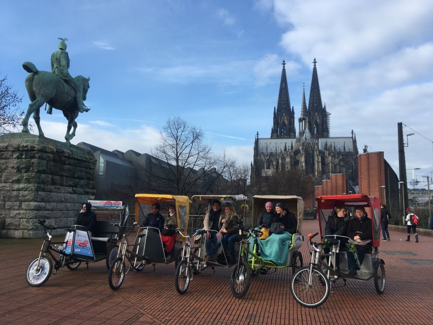 Cologne: Private Rickshaw Tour - Heinzelmännchenbrunnen: a quick story stop with character