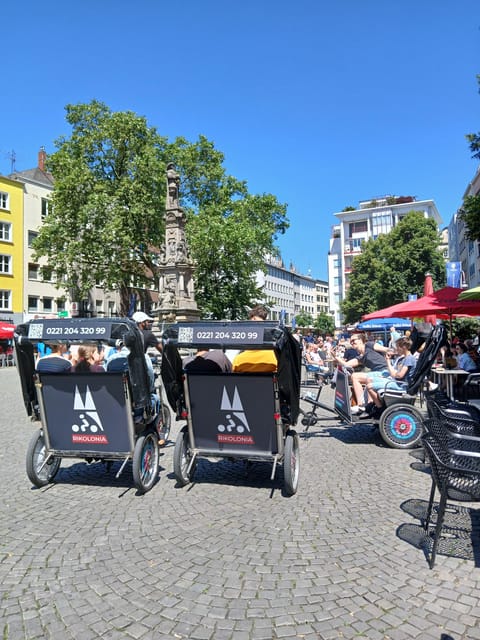 Cologne: Rickshaw Sightseeing Tour - Medieval Town Hall Stops Where Details Matter