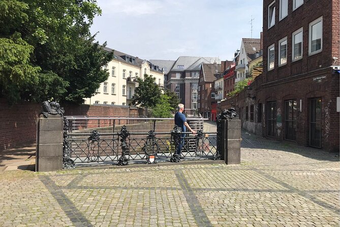 Düsseldorf Walking Tour: Explore Top Sights & Hidden Gems - Stop 5: Rhine promenade views and the city neighborhoods you see from the water