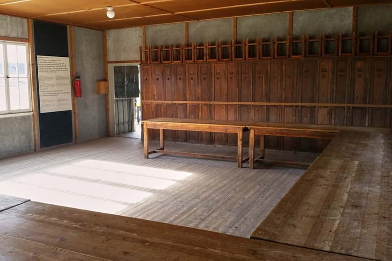 From Munich: Dachau Memorial Site Guided Tour - The train and bus ride to Dachau, and why it sets the tone