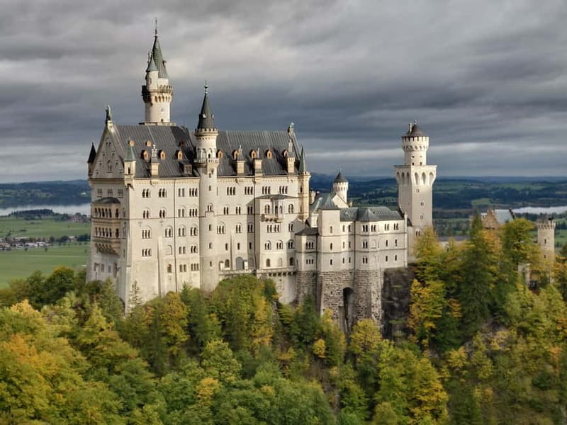 From Munich: Royal Fairytale Tour - Oberammergau: Passion Play village, ornate frescos, and free time that actually helps