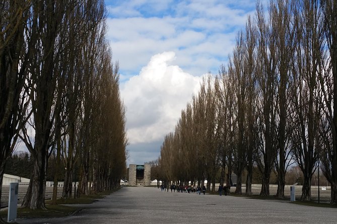 Guided Dachau Concentration Camp Memorial Site Tour with Train from Munich - The pace, walking, and weather reality check