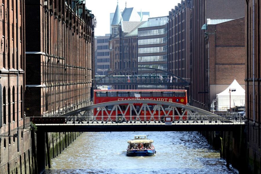 Hamburg Discovery: Bus Tour with Harbor & Alster Lake Cruise - Entering Line A: double-decker bus views, 20 stops, 11-language narration