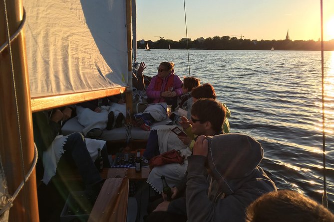 Hamburg Small-Group Sunset Sailing Cruise on Lake Alster - Your boat ride basics: small group, life vest, and a skipper who runs a sailing show