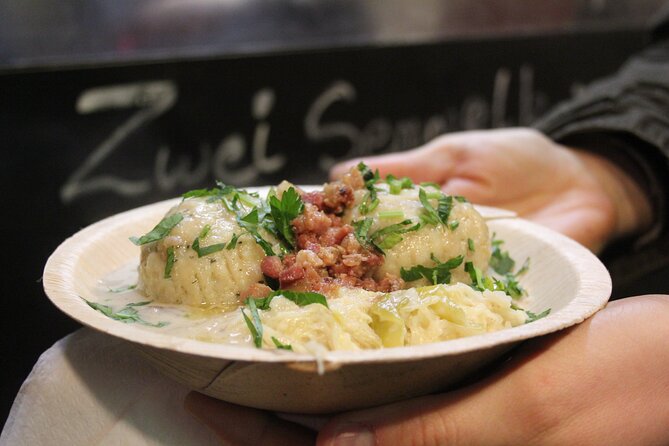 Munich Christmas Market Food Tour with Tastings - Glühweinoase: the tiny stop that turns a drink into a story