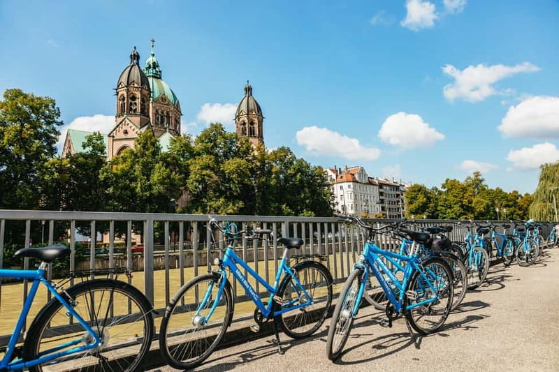 Munich: Guided City Tour by Bike with Beer Garden Stop - The English Garden’s Eisbach surfers, a park stop with a story