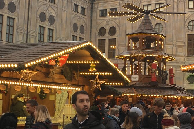 Original Munich Christmas Market Tour with Festive Wine and Food - Odeonsplatz and the Residence Palace courtyard, where the medieval vibe starts